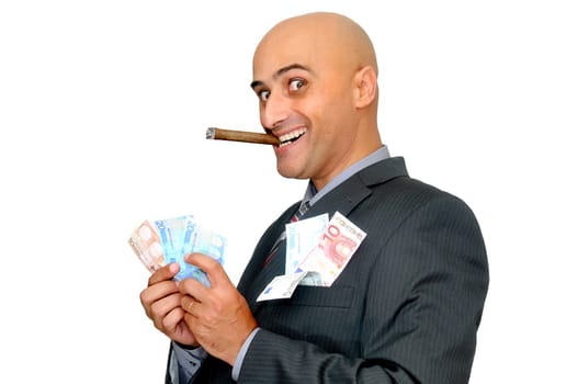 Businessman with money and a cigar isolated in white