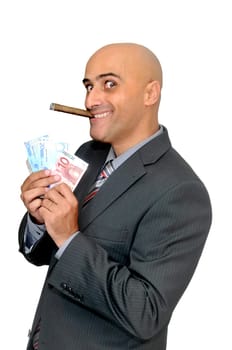 Happy businessman with money