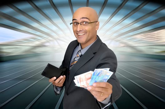 Happy businessman with money