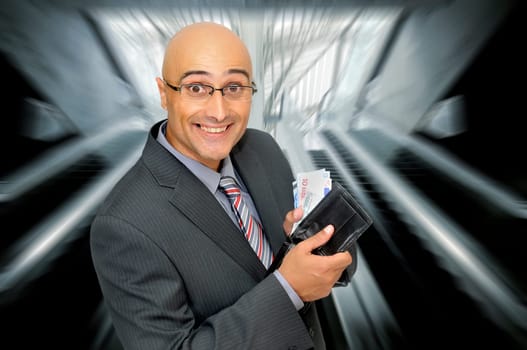 Happy businessman with money