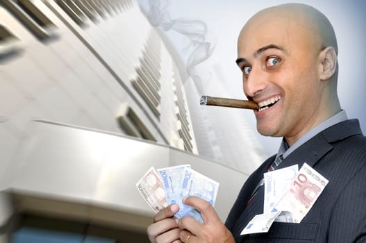 Businessman with money and a cigar