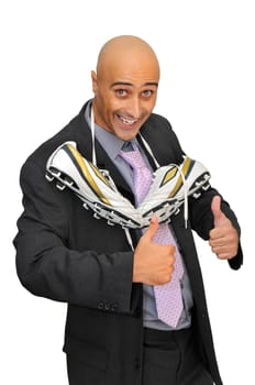 Businessman with a soccer ball isolated in white