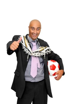 Businessman with a soccer ball isolated in white