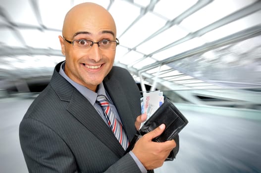 Happy businessman with money
