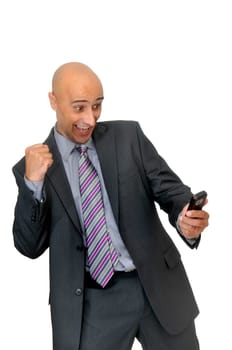 Happy businessman with cellphone