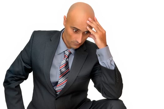 Worried businessman isolated in white