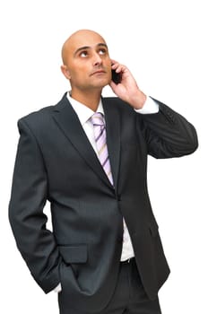 Businessman with cellphone isolated in white