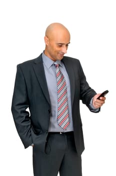 Happy businessman with cellphone