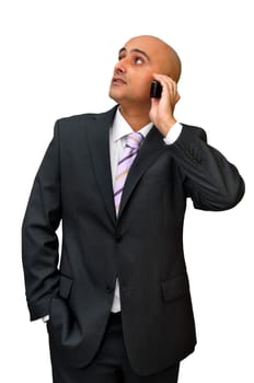 Businessman with cellphone isolated in white