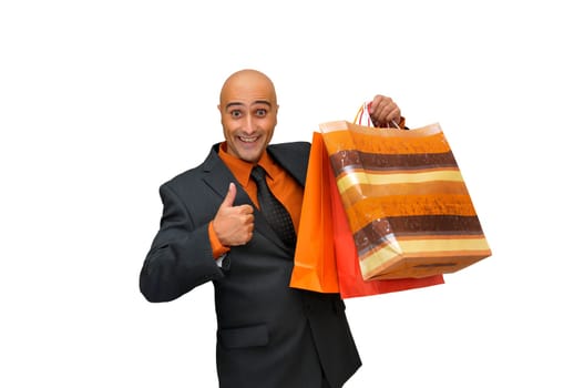 Elegant businessman with shopping bags isolated in white