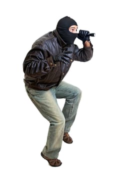 Burglar with flashlight isolated in white