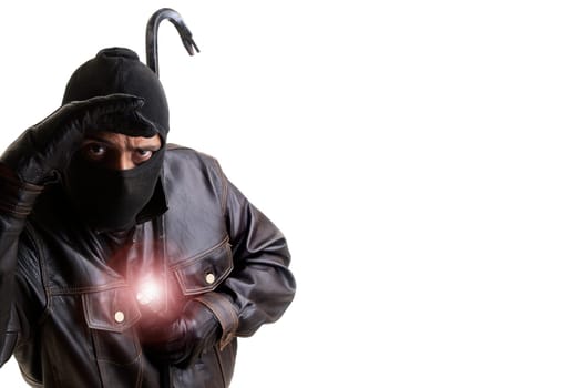 Burglar with flashlight and crowbar isolated in white