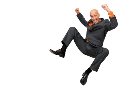 Happy businessman jumping high isolated in white