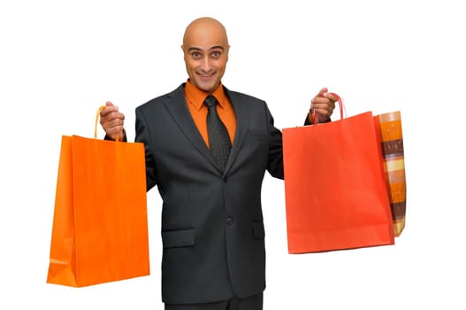 Elegant businessman with shopping bags isolated in white