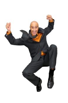 Happy businessman jumping high isolated in white