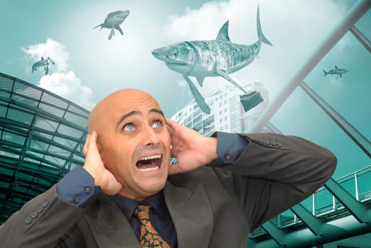 Businessman sreaming with business sharks all around