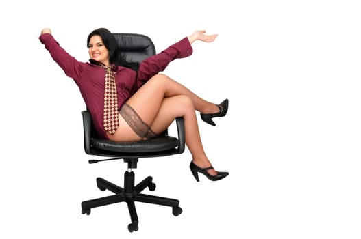 Sexy businesswoman in a chair with tie and stockings isolated in white
