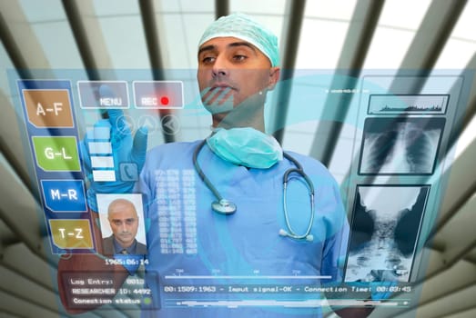 Doctor with hightech computer screen viewing patient data