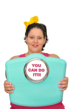 Out of focus large girl holding a scale isolated in white
