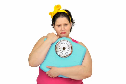 Large girl with sad face and scale isolated in white
