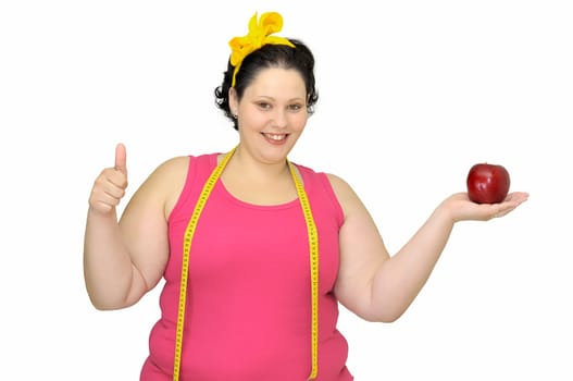 Large girl with apple and measuring tape
