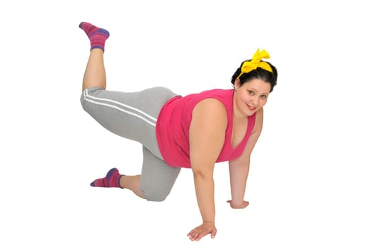 Large girl doing fitness exercises isolated in white