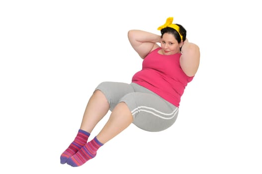 Large girl doing fitness exercises isolated in white