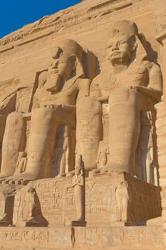 Sculptures of King Ramses II and queen Nefertari in Abu Simbel Temple (Egypt)