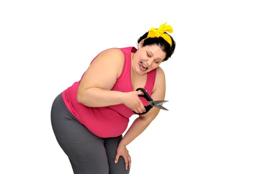 Large girl isolated in white with scissors and yellow tape