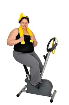 Large girl with fitness bicycle isolated in white