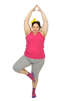 Large girl doing fitness exercises isolated in white