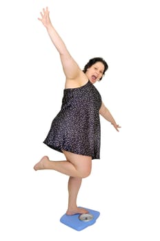 Large young woman in a scale
