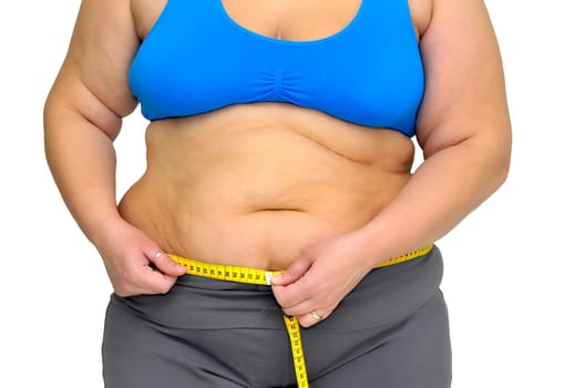 Large girl body part with measuring tape isolated in white