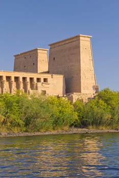 The Temple of Isis at Philae island in Lake Nasser, seen from a boat. Near the town of Aswan ( Egypt)