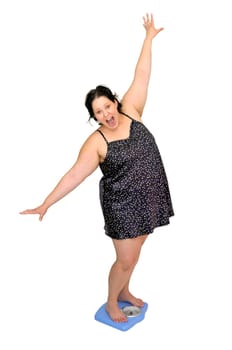 Large young woman in a scale