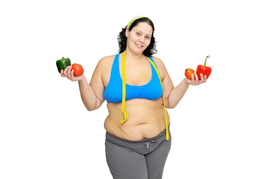 Large girl with vegetables isolated in white