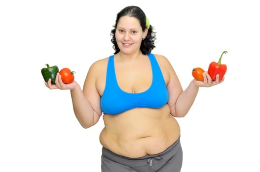 Large girl with vegetables isolated in white