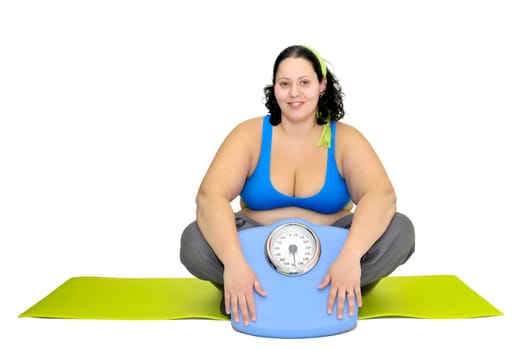 Large girl with weight scale isolated in white