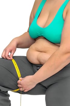 Large girl body part with measuring tape isolated in white