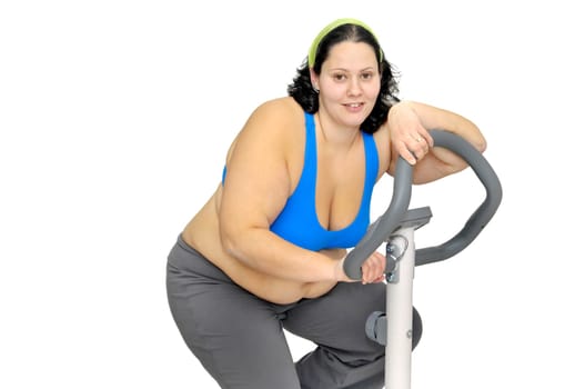 Large girl exercising isolated in white