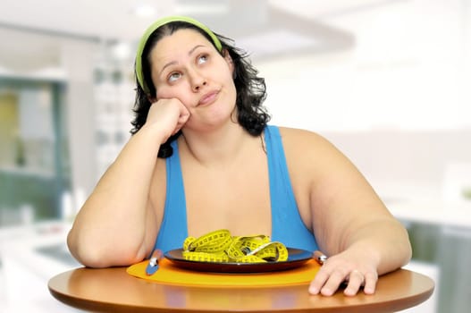 Large girl eating a measuring tape