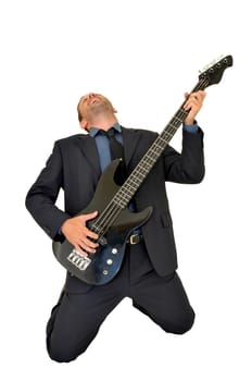 Young man in a suit with guitar