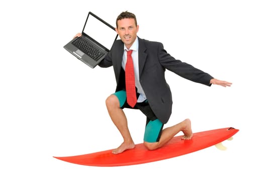 Young businessman with surf board and laptop