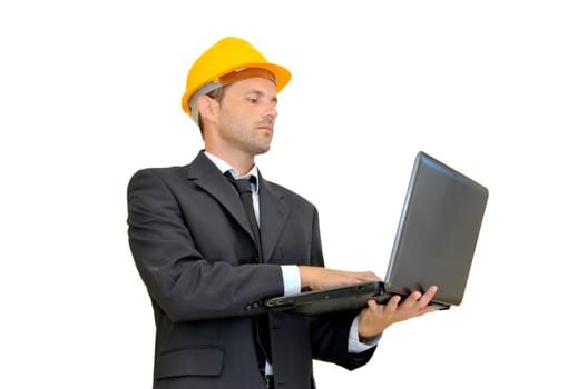 Engineer with hat and laptop isolated in white