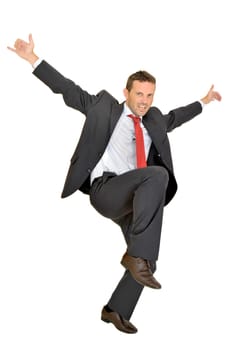 Young businessman jumping isolated in white