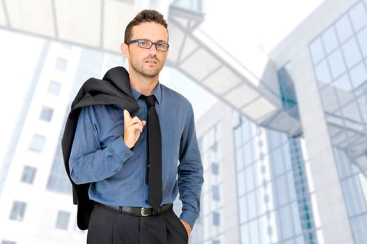 Businessman posing in a business center