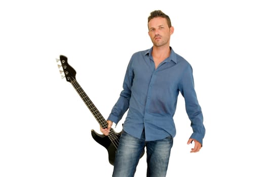 Young man posing with a guitar
