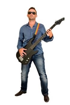 Young man posing with a guitar