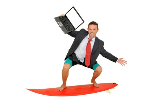 Young businessman with surf board and laptop