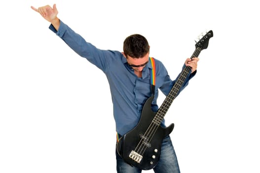 Young man posing with a guitar